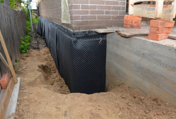SJ Waterproofing Pros technician performing targeted Sump Pump Installation assessment in Albany, OR